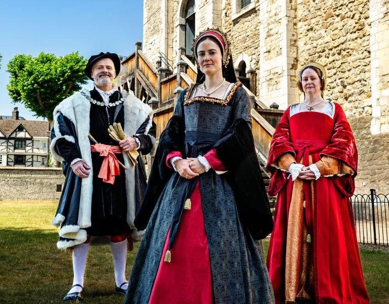 Performer dressed as Queen Anne Boleyn greeting visitors at the Tower of London