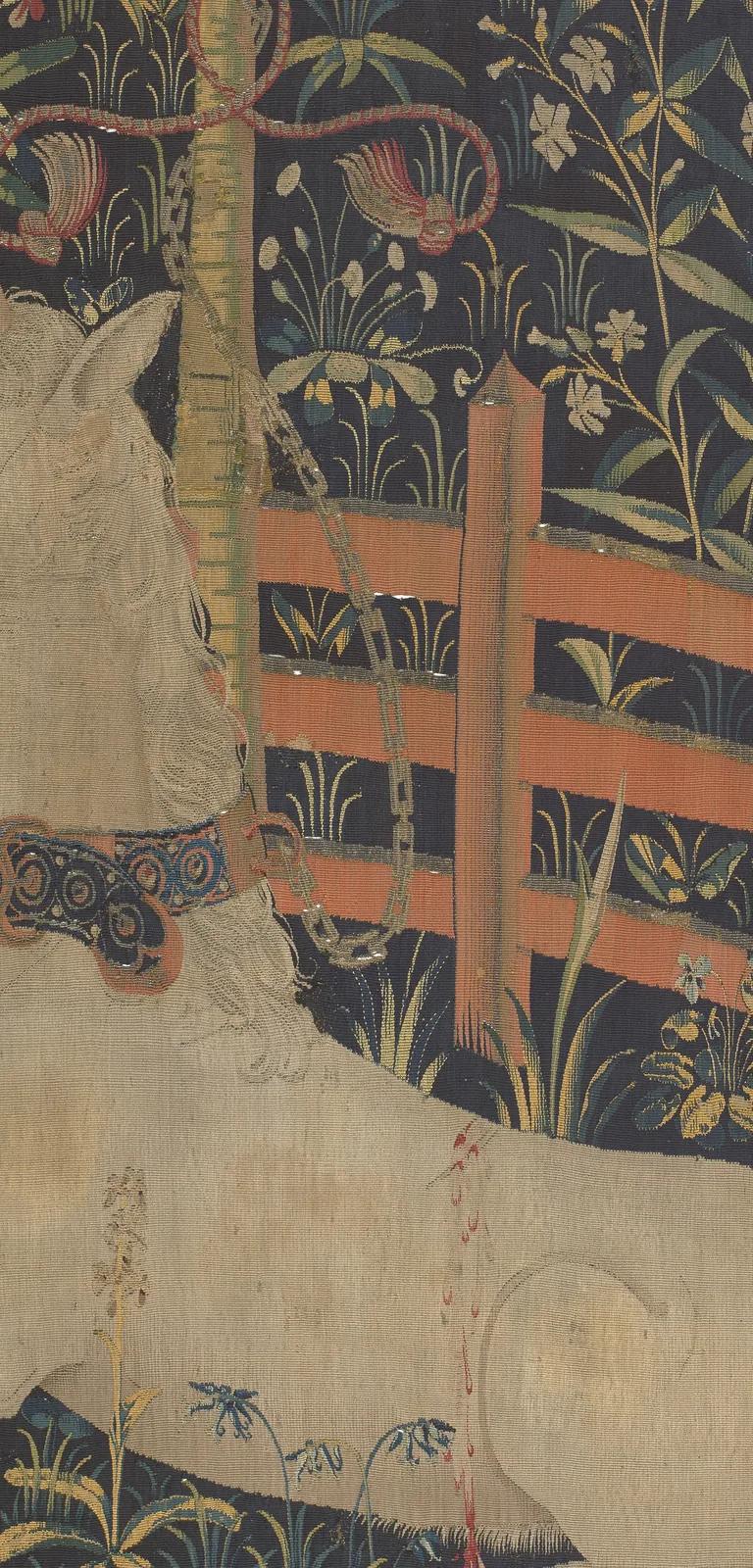 The Unicorn in Captivity, the final panel of the Unicorn Tapestries, showing a unicorn fenced within a flowering garden