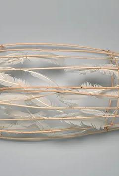 Truman Lowe's Feather Canoe, made from peeled willow saplings, feathers and copper wire