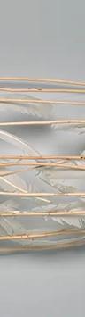 Truman Lowe's Feather Canoe, made from peeled willow saplings, feathers and copper wire