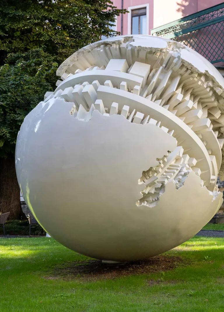 Arnaldo Pomodoro's Sfera grande in the Giardino d'Alessandro, Gallerie d'Italia Milano