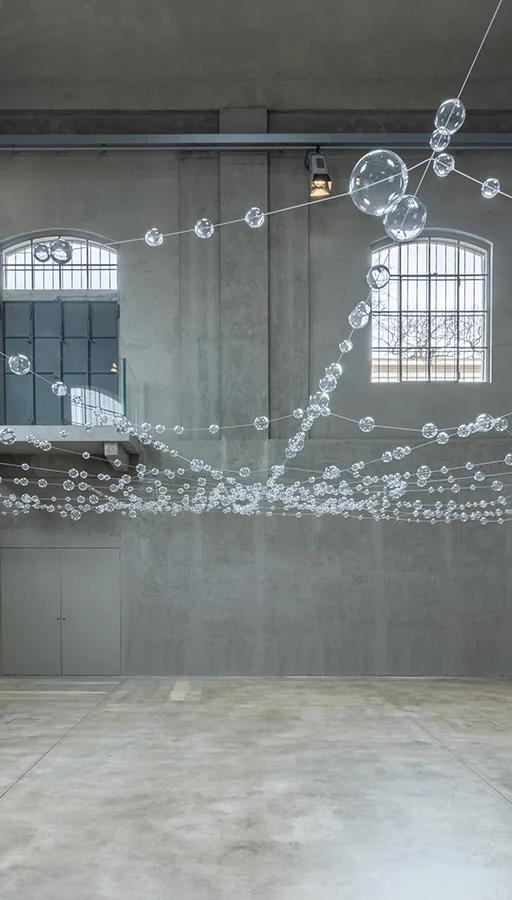 Mona Hatoum's Over, under and in between installation in the Cisterna, Fondazione Prada