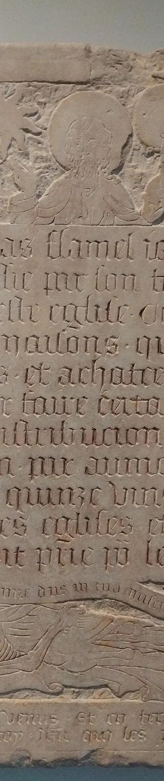 The carved stone funerary epitaph of Nicolas Flamel, held at the Musée de Cluny