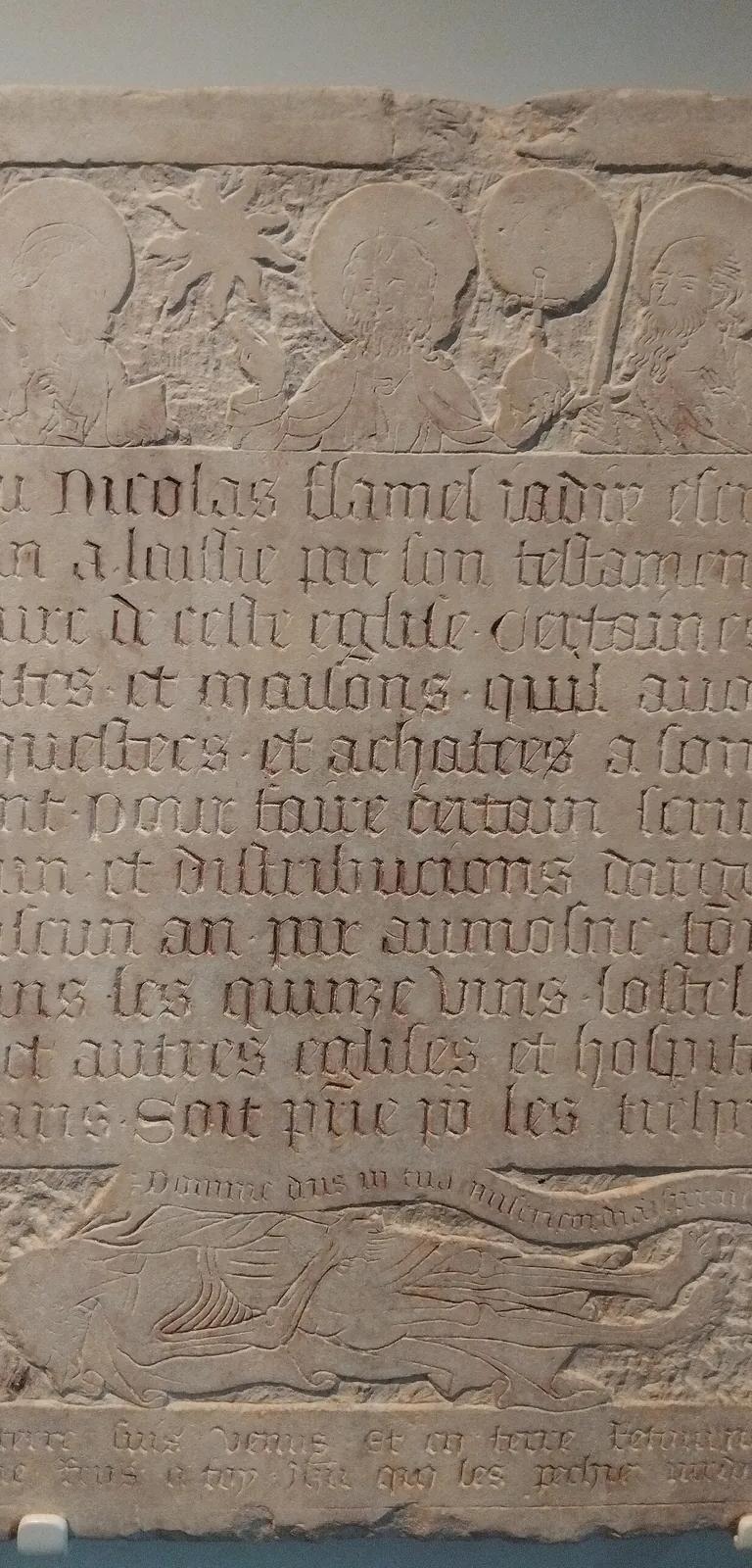 The carved stone funerary epitaph of Nicolas Flamel, held at the Musée de Cluny