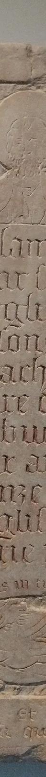 The carved stone funerary epitaph of Nicolas Flamel, held at the Musée de Cluny