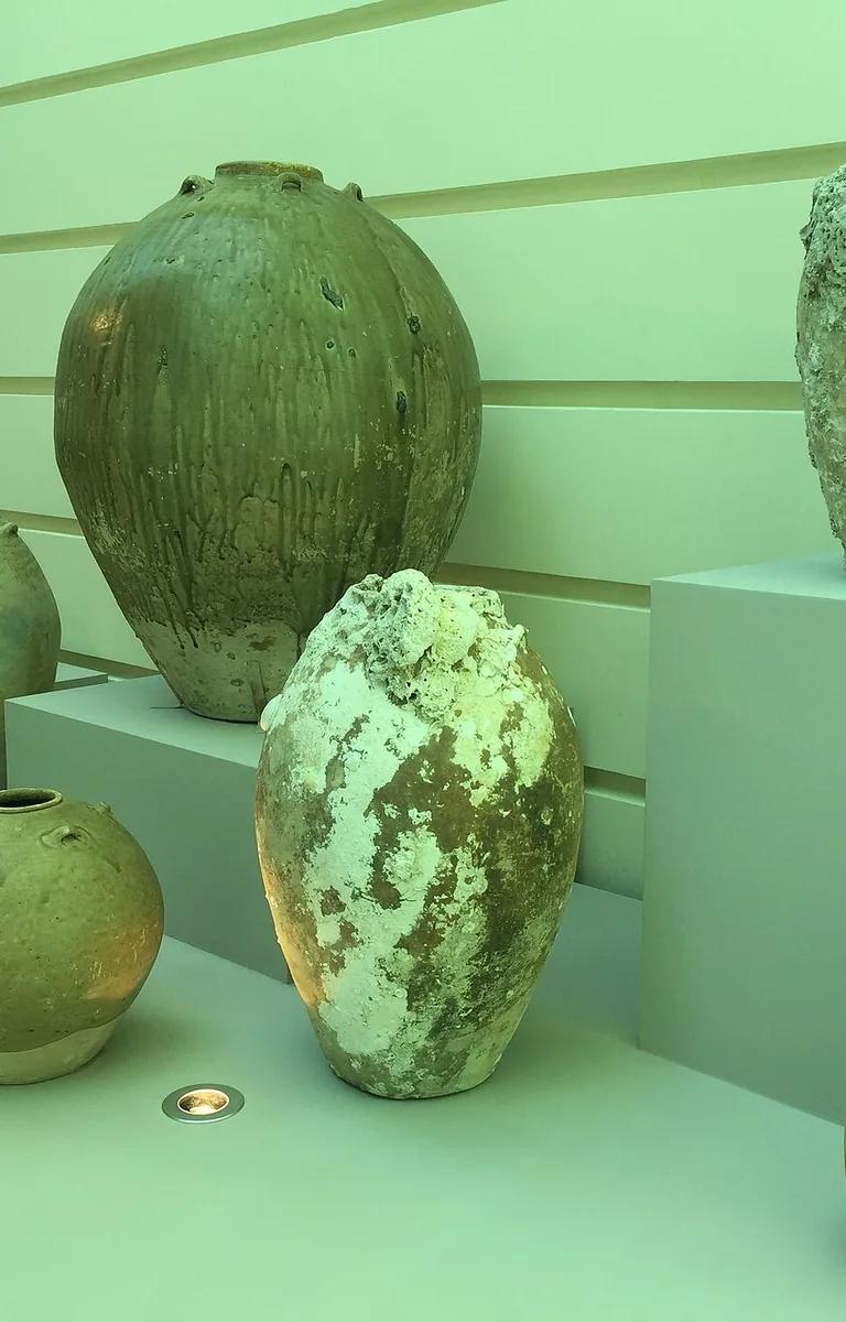 Stoneware storage jars from the Tang Shipwreck cargo on display in the Khoo Teck Puat Gallery