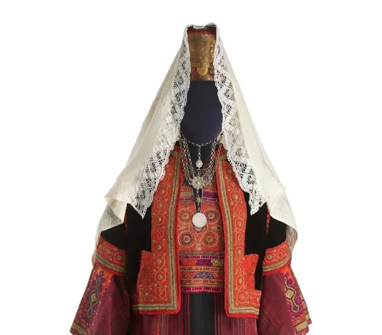 Bethlehem bridal dress with embroidery and coin headdress