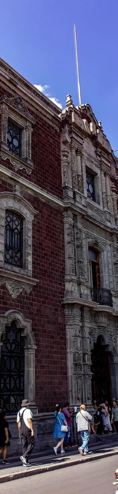 Baroque stone facade of the Antiguo Colegio de San Ildefonso in Mexico City's historic centre