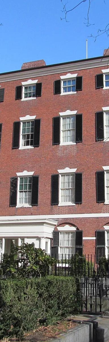 The Federal-style brick facade of 55 Mount Vernon Street, the Nichols House Museum, on Beacon Hill in Boston