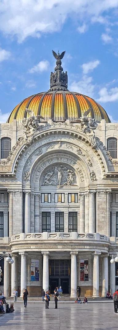 White marble facade and domes of the Palacio de Bellas Artes, Mexico City