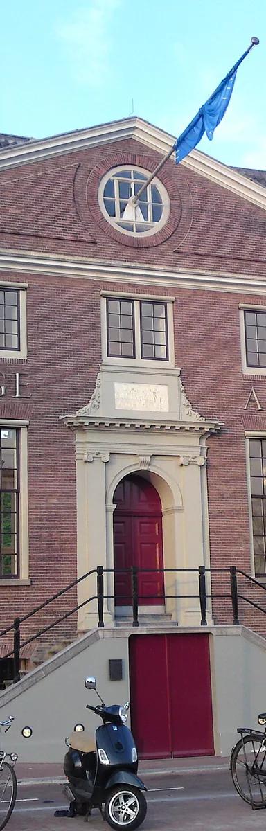 Entrance facade of the Amstelhof, home of H'ART Museum, on the Amstel in Amsterdam