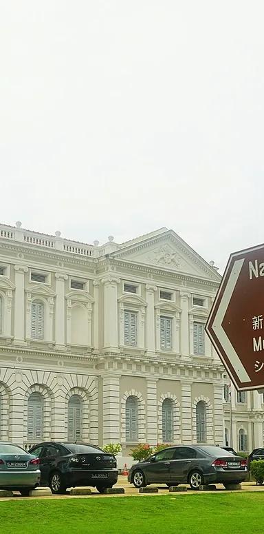 Exterior of the National Museum of Singapore's neoclassical building with its stained-glass dome