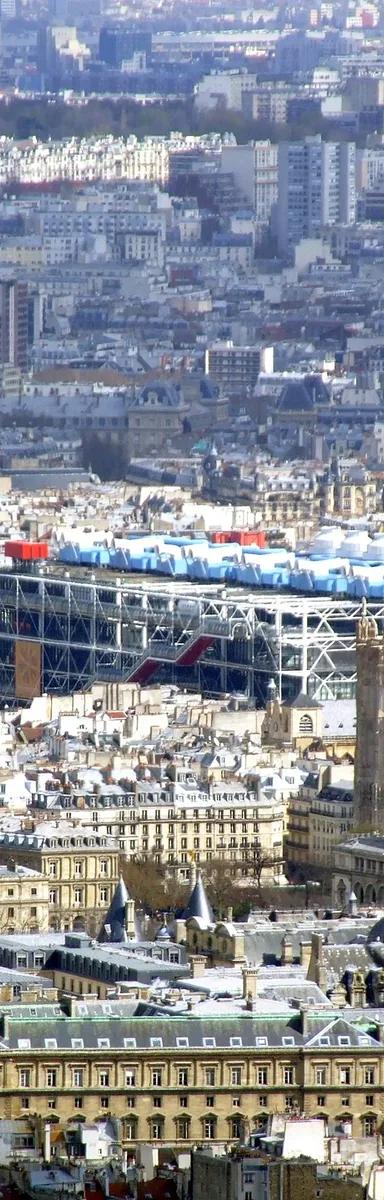 The Centre Pompidou's colourful inside-out facade seen across the Paris skyline from the Tour Montparnasse