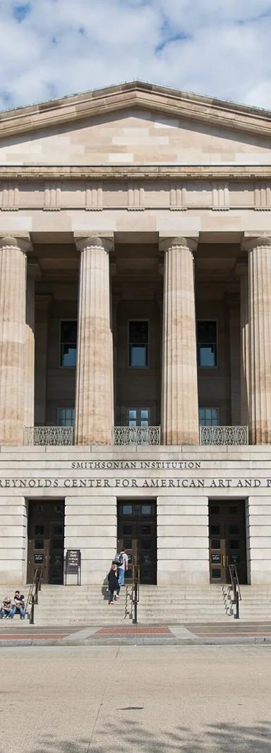 The Greek Revival south (F Street) portico of the Old Patent Office Building, home of the National Portrait Gallery in Washington, DC