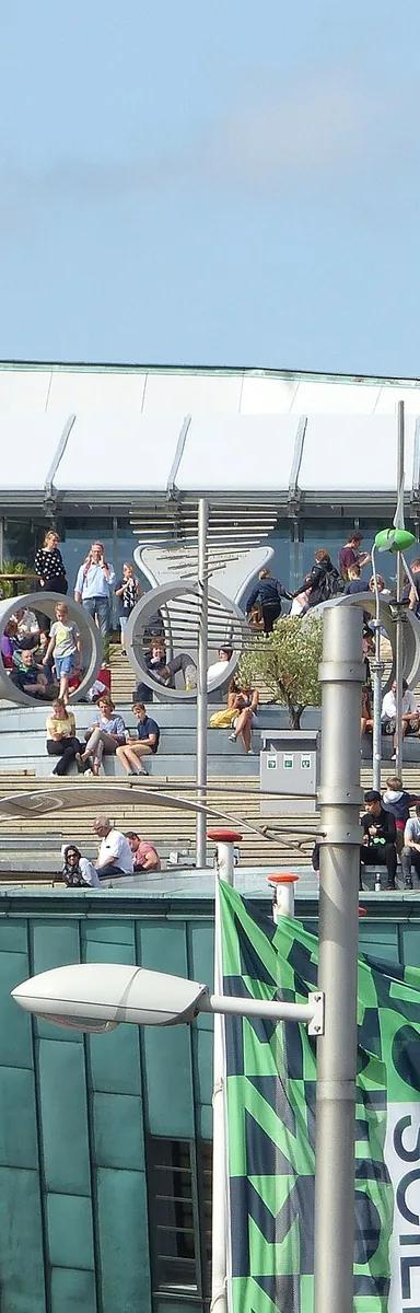 The green copper-clad, ship-shaped NEMO Science Museum building by Renzo Piano rising over the Oosterdok in Amsterdam
