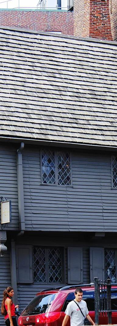 Exterior of the Paul Revere House, a two-storey timber-framed dwelling with overhanging upper floor, at 19 North Square in Boston's North End