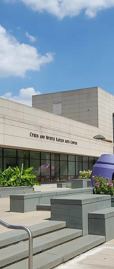 Exterior of the Cyrus and Myrtle Katzen Arts Center at American University, with sculptures in the terraced garden in front