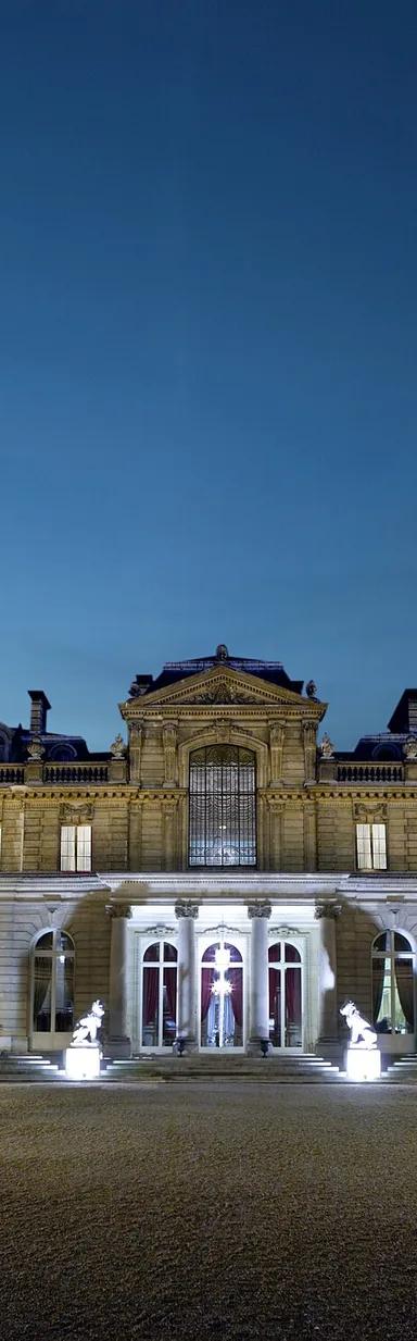 Night-time exterior of the Musée Jacquemart-André mansion at 158 Boulevard Haussmann, Paris