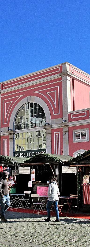 Pink facade of the Museu do Fado on Largo do Chafariz de Dentro, Alfama, Lisbon