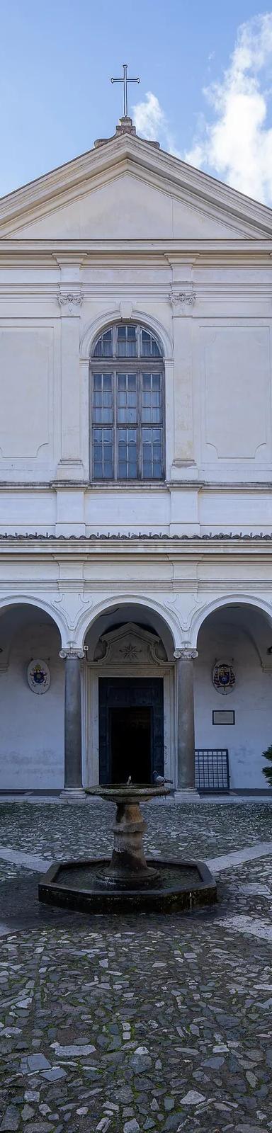 Exterior courtyard view of the Basilica di San Clemente al Laterano, Rome