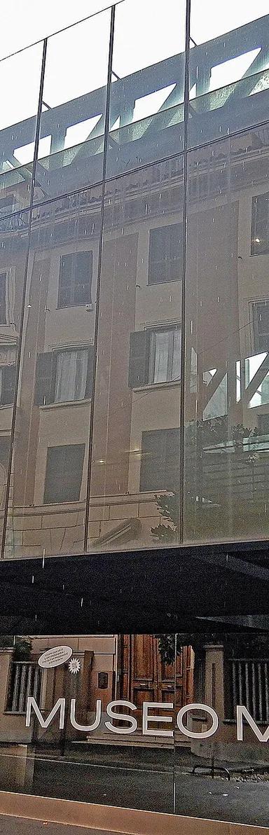 Glass facade of MACRO with MUSEO MACRO signage at the Via Nizza entrance, Rome